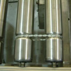 powered roller conveyor showing bands