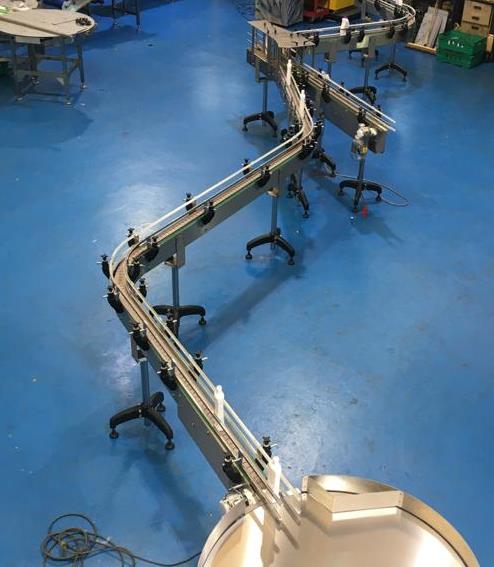 Narrow Conveyor Loading a Rotary Table
